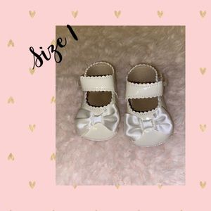 White baby shoes